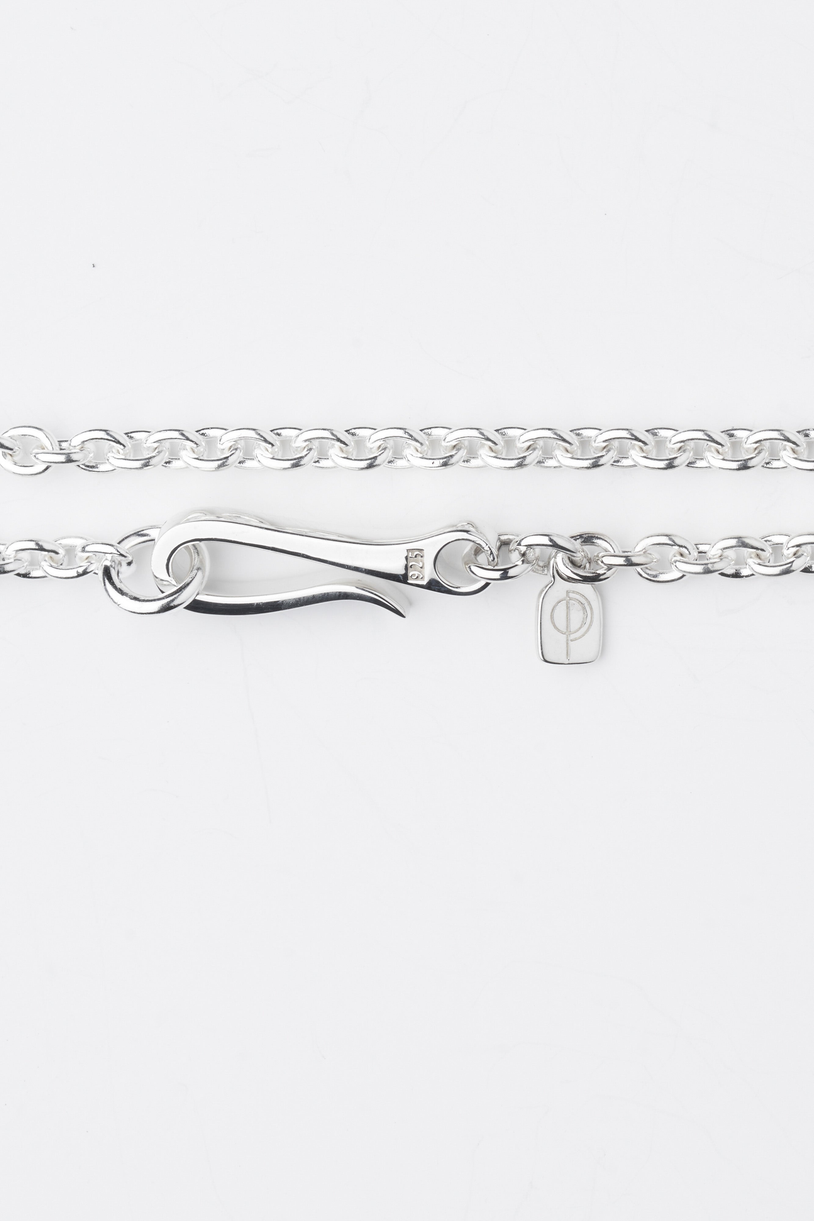 Sterling silver Anchor Chain Hook Bracelet by O.P Jewellery with a signature clasp and engraved logo tag.