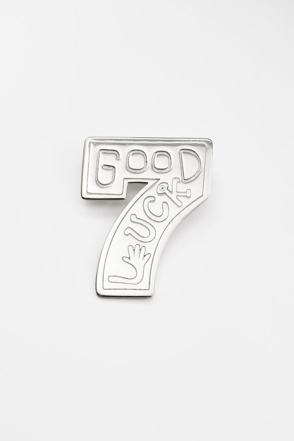 O.P Jewellery Lucky Number Seven Pin in recycled 925 sterling silver against a plain background.