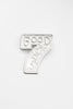 O.P Jewellery Lucky Number Seven Pin in recycled 925 sterling silver against a plain background.