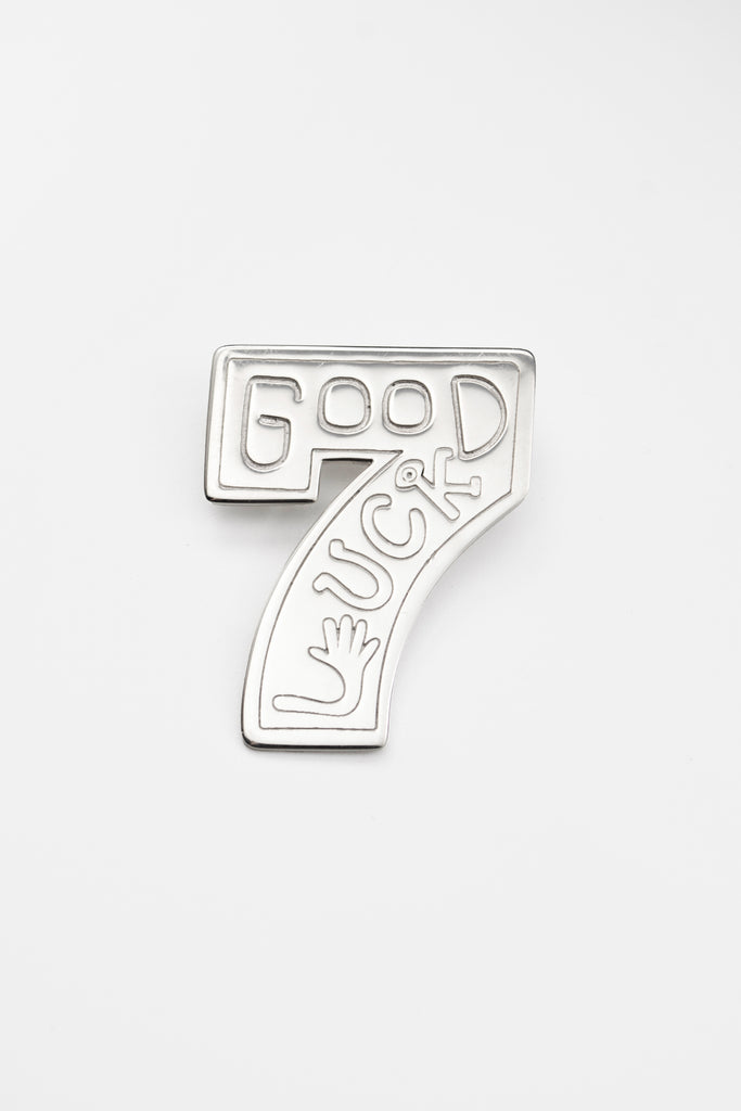 O.P Jewellery Lucky Number Seven Pin in recycled 925 sterling silver against a plain background.