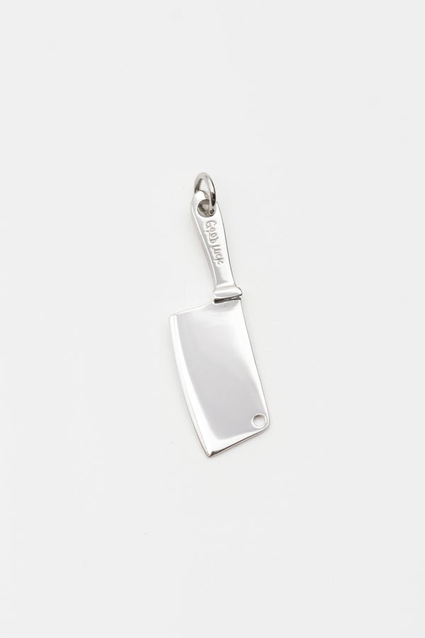 O.P Jewellery chef knife pendant crafted in recycled 925 sterling silver with engraved handle detail against a light background.