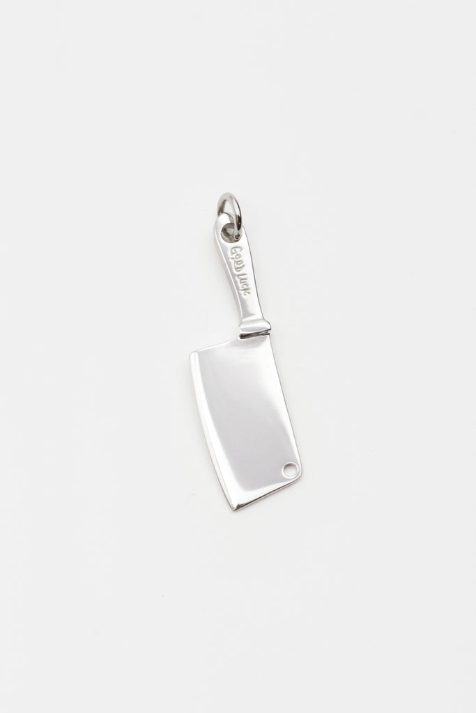 O.P Jewellery chef knife pendant crafted in recycled 925 sterling silver with engraved handle detail against a light background.