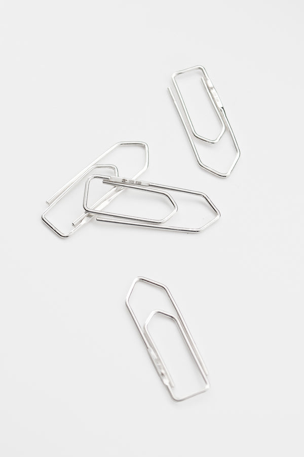 O.P Jewellery recycled 925 silver Clip pendants arranged on a light background.