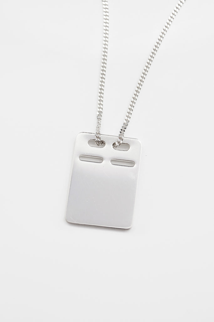 O.P Jewellery ID Badge Pendant crafted in recycled silver on a matching chain against a plain background.